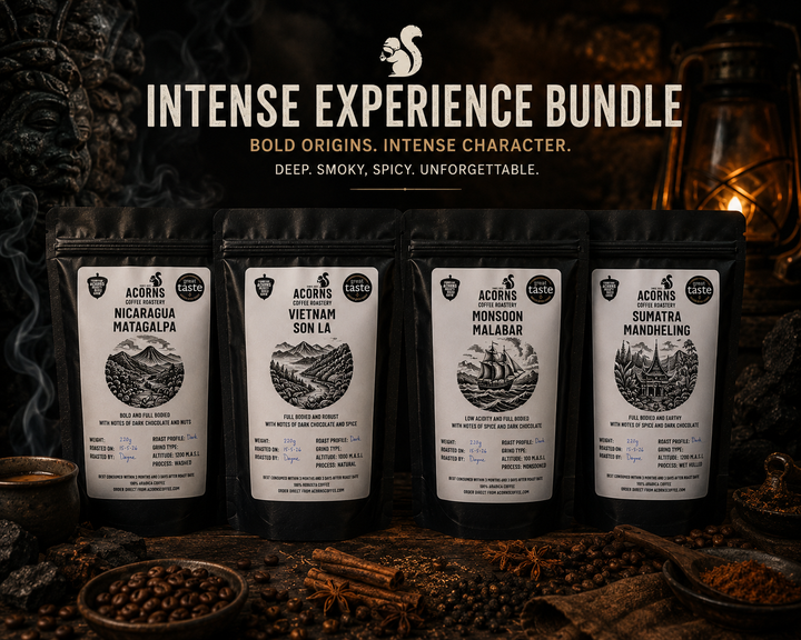 Four coffee packages in the intense experience bundle on a dark background, featuring the brand &